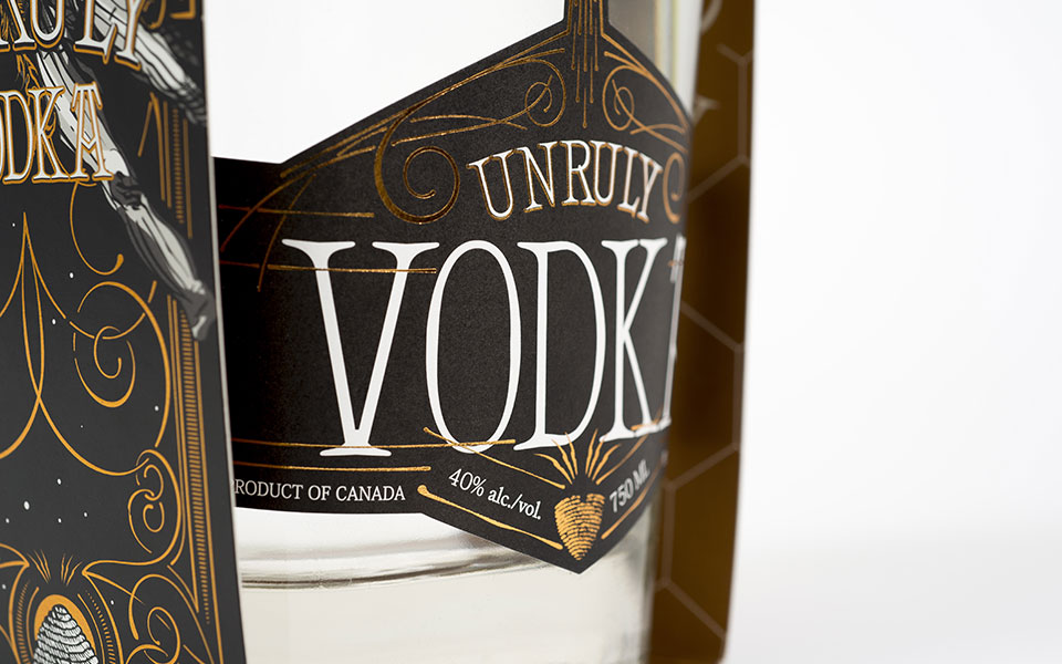 Unruly Vodka black and gold label